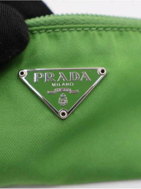 Prada Handbags - Prada Green Nylon Cosmetic Pouch with Silver Triangle Logo